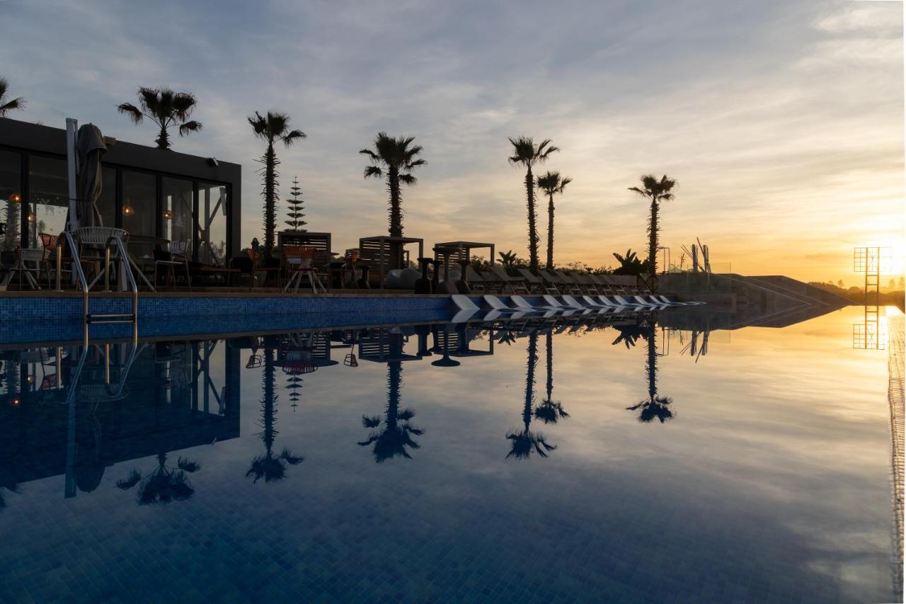 铂尔曼玛扎甘皇家高尔夫酒店及Spa 杰迪代 外观 照片 Sunset at the pool