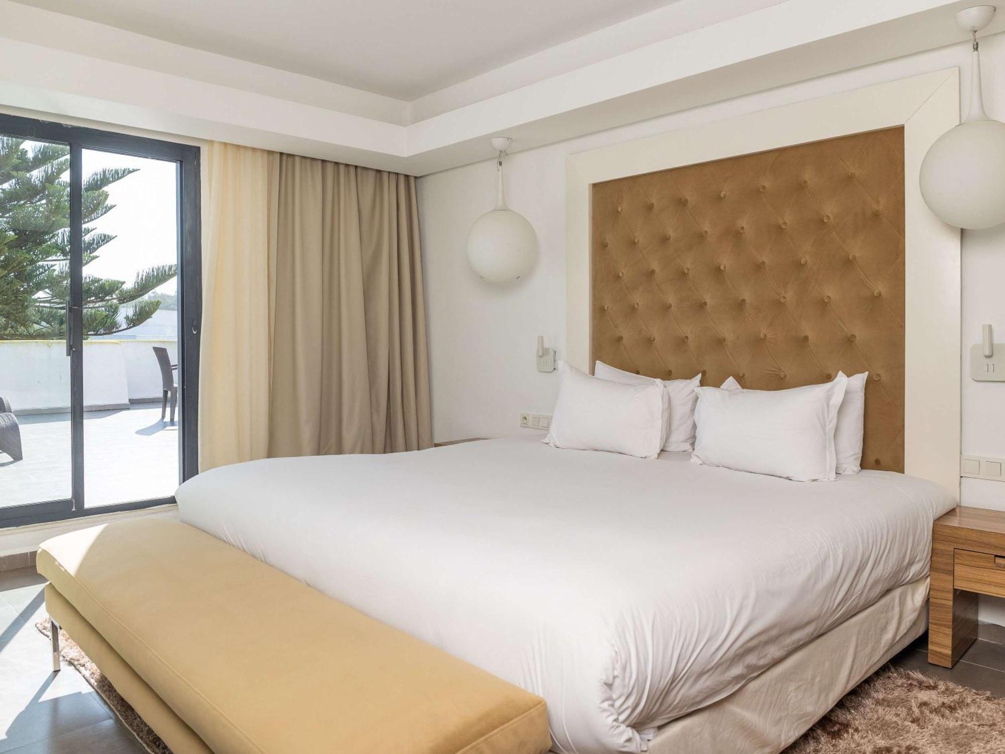 铂尔曼玛扎甘皇家高尔夫酒店及Spa 杰迪代 外观 照片 A bedroom at the hotel
